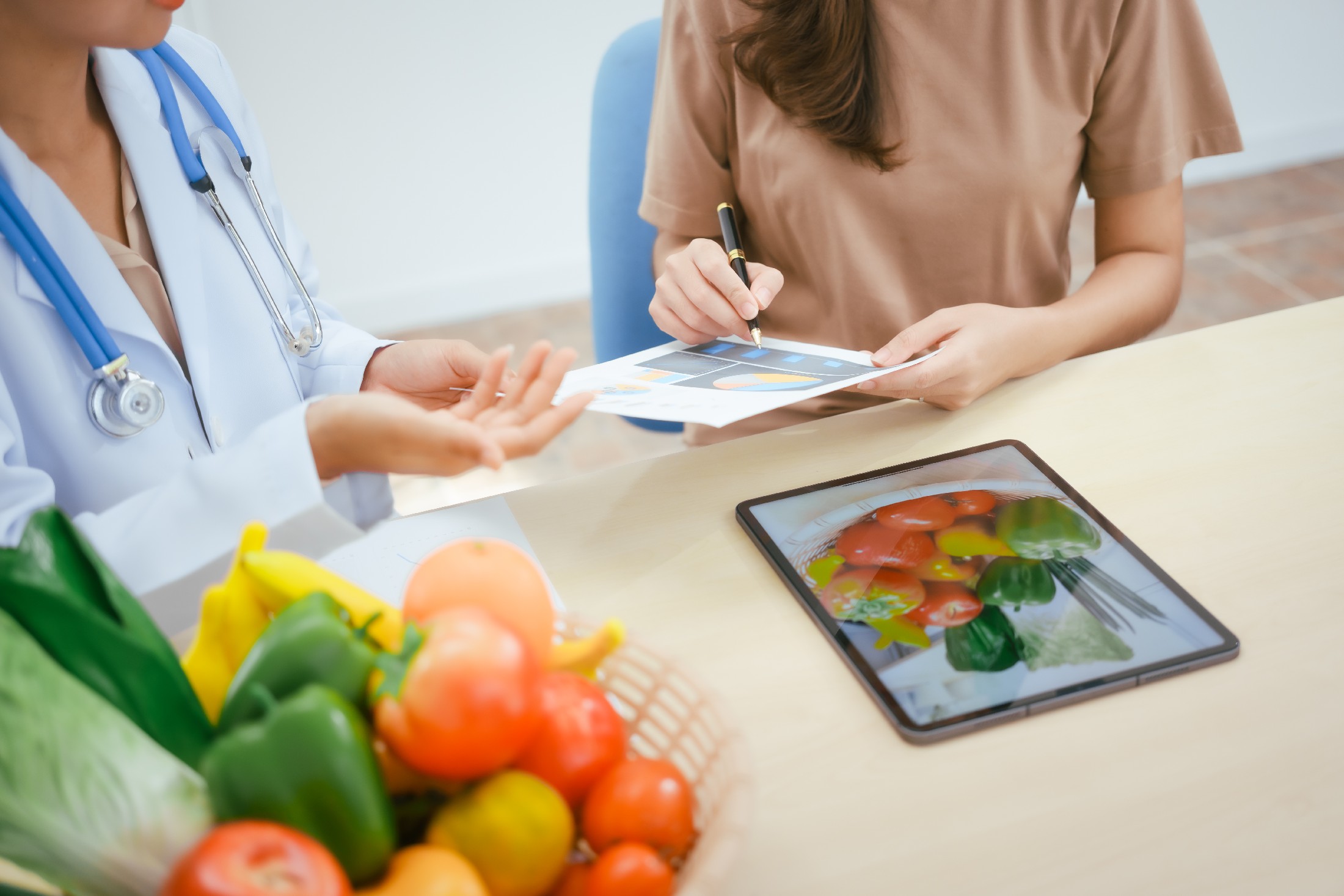 A Young Female Nutritionist Expert Talks To A Fema 2025 08 25 18 44 31 Utc
